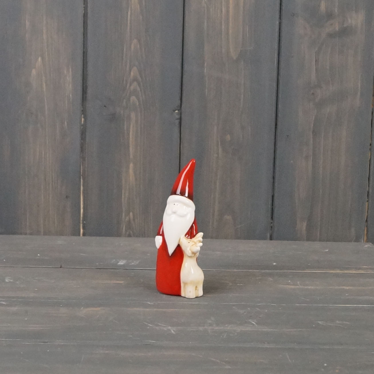 Small Red Ceramic Santa with Reindeer detail page